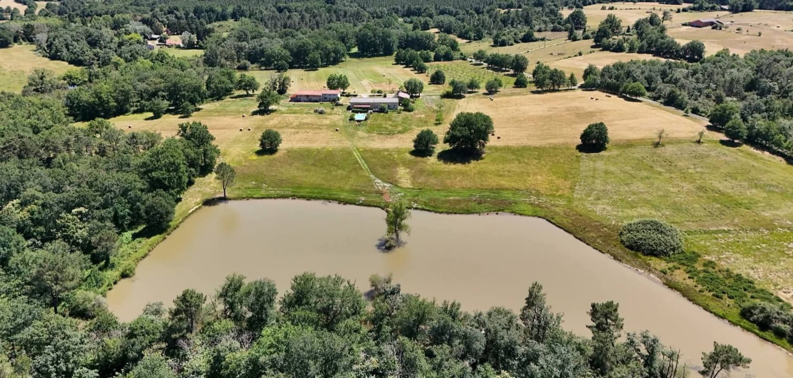 EXCLUSIVE 200-ACRE COUNTRY HOME