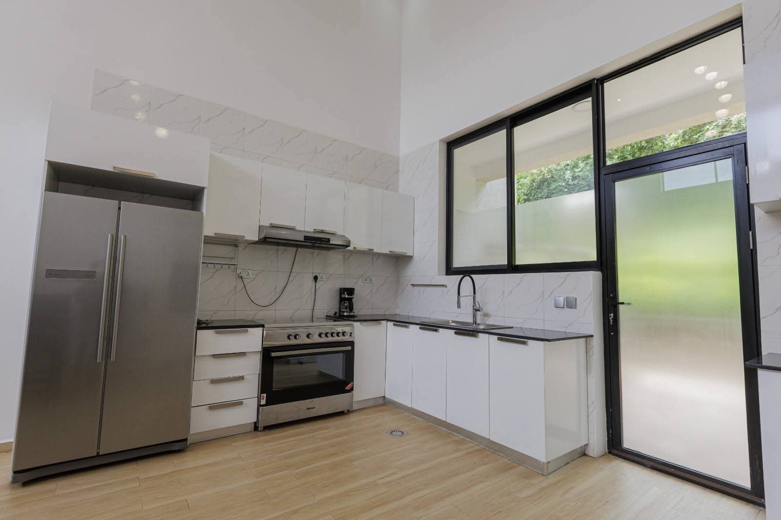 SOPHISTICATED MODERN VILLA WITH GARDEN, POOL & GYM SPACE – KACYIRU